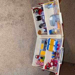 Play mobile take along house.